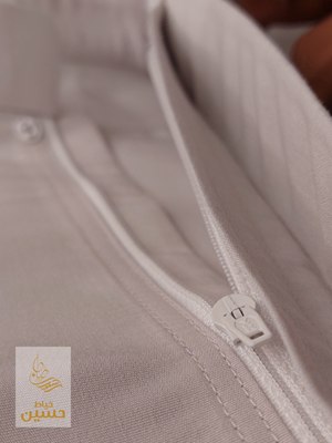 Close-up of the front pleat and concealed zip